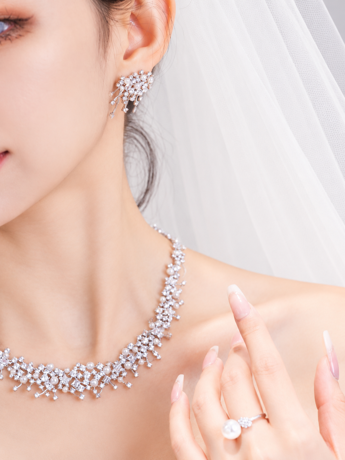 Starlight Pearl Bridal Jewelry Set featuring a matching necklace and earrings with luminous pearls and sparkling premium-grade zirconia accents.