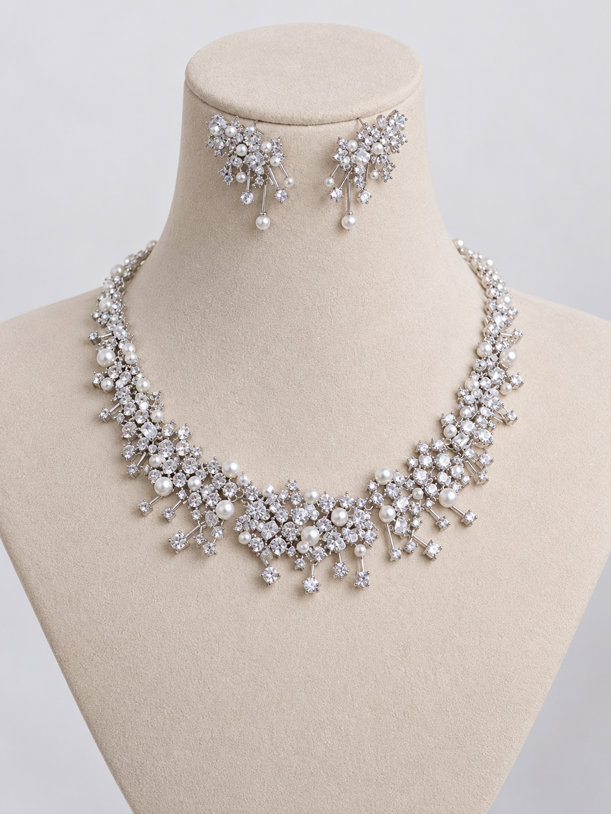 Starlight Pearl Bridal Jewelry Set featuring a matching necklace and earrings with luminous pearls and sparkling premium-grade zirconia accents.