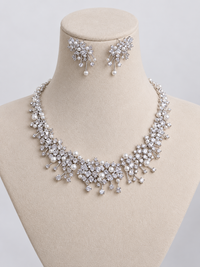Starlight Pearl Bridal Jewelry Set featuring a matching necklace and earrings with luminous pearls and sparkling premium-grade zirconia accents.