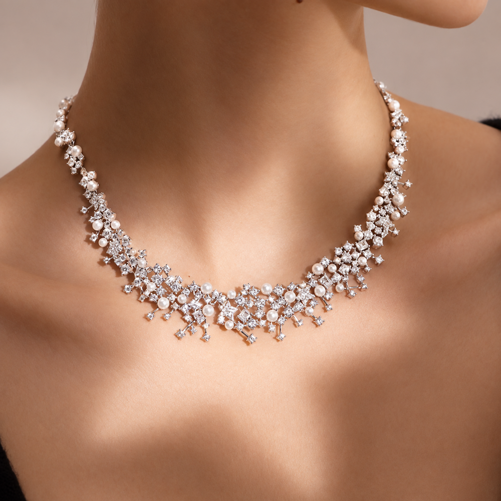 Starlight Pearl Bridal Jewelry Set featuring a matching necklace and earrings with luminous pearls and sparkling premium-grade zirconia accents.