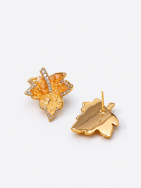 Autumn Ember Crystal Maple Leaf Earrings with layered amber and golden yellow crystals and sparkling leaf details.