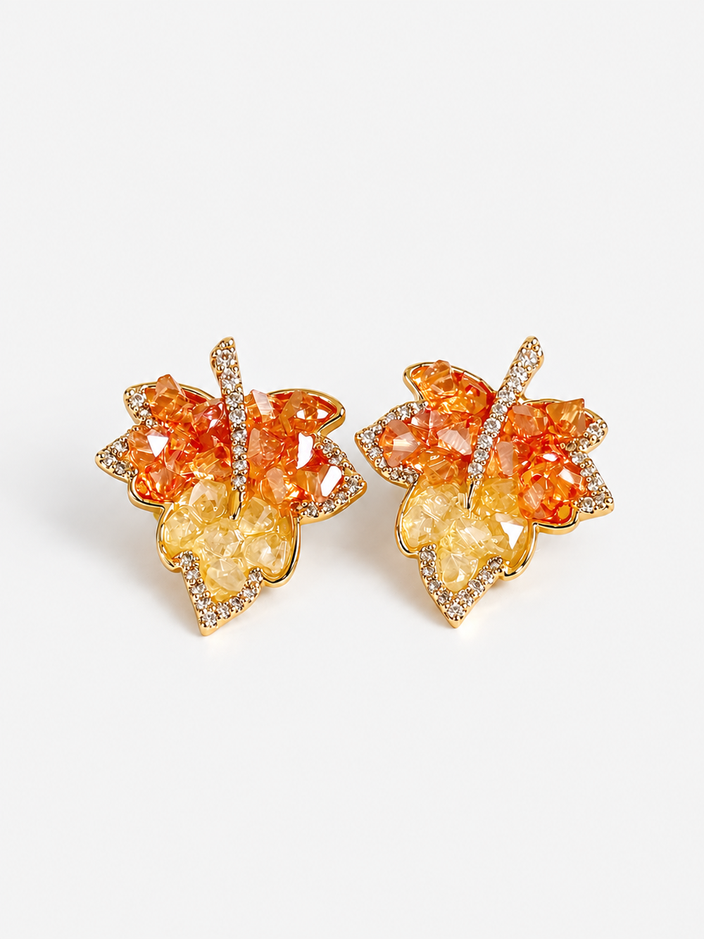 Autumn Ember Crystal Maple Leaf Earrings with layered amber and golden yellow crystals and sparkling leaf details.