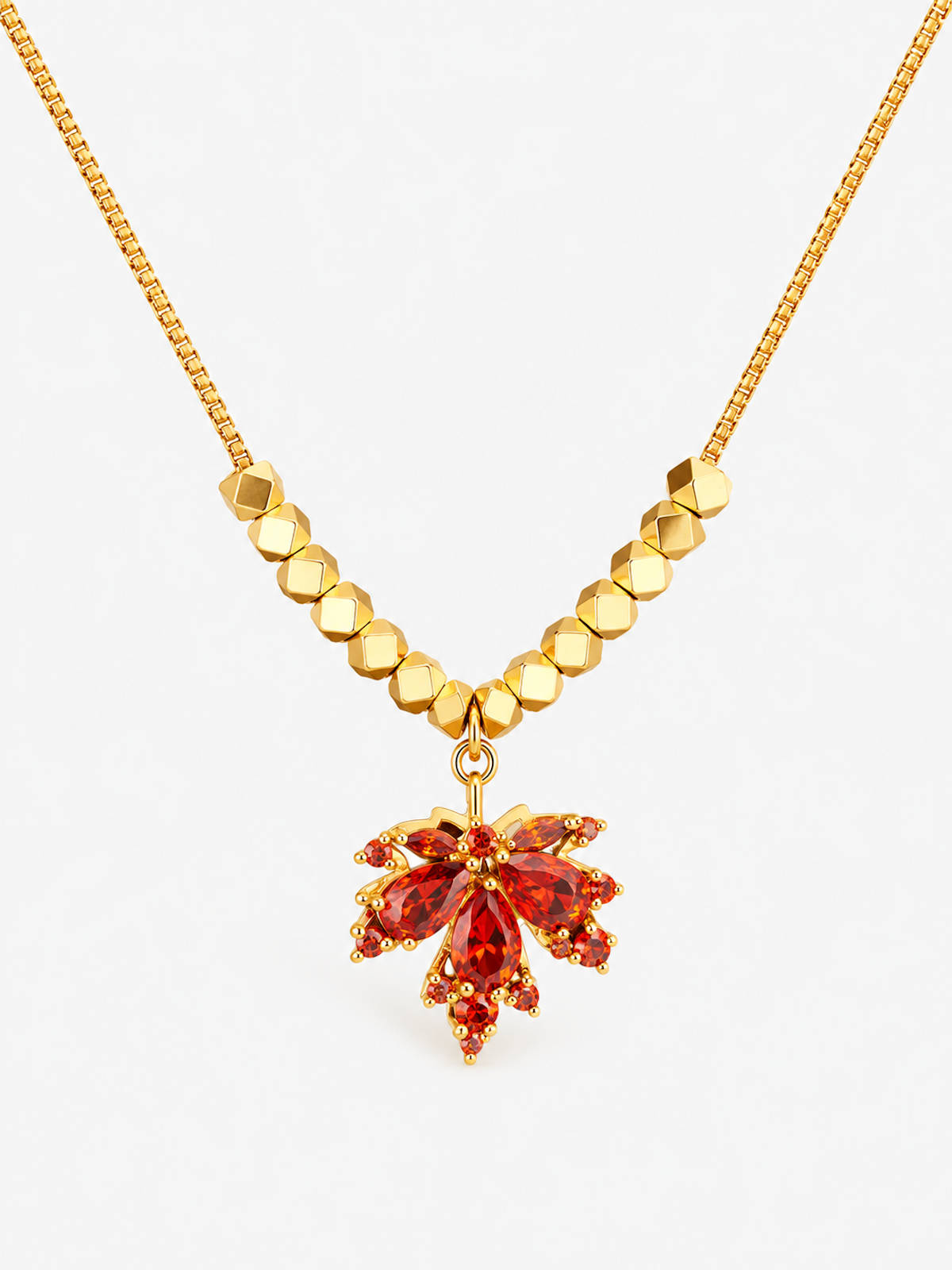 Fiery Orange Crystal Maple Leaf Necklace with orange crystal leaf pendant, faceted golden beads and delicate gold-plated chain.