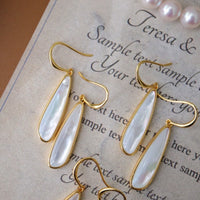 Sculptural Lumière Mother of Pearl Earrings crafted with genuine mother of pearl in gold vermeil.