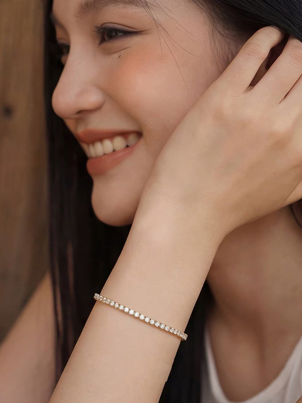 Timeless Diamond-Look Tennis Bracelet featuring a continuous row of premium-grade zirconia set in a classic gold-tone tennis bracelet design.
