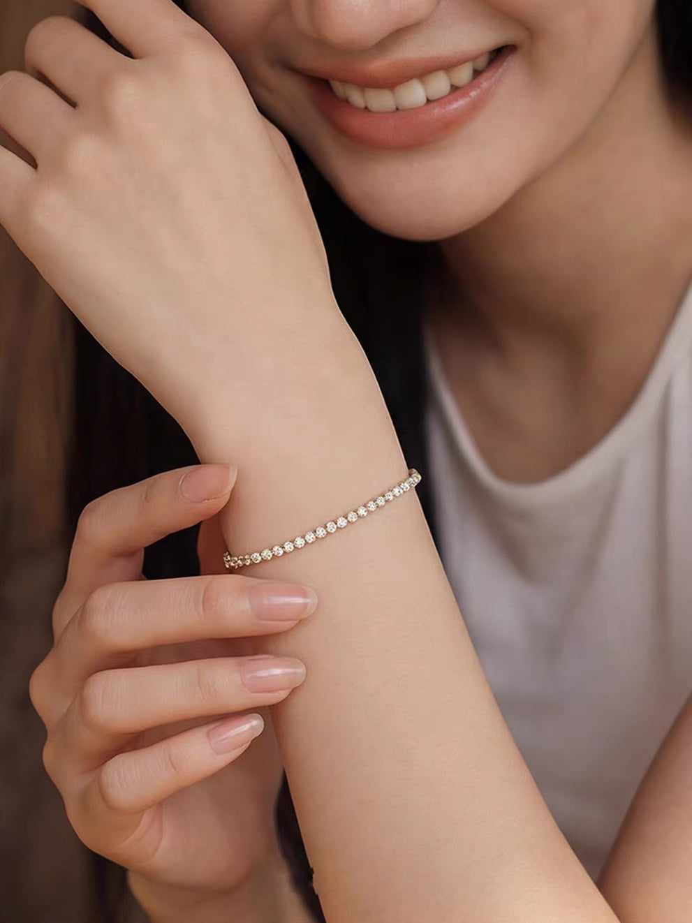 Timeless Diamond-Look Tennis Bracelet featuring a continuous row of premium-grade zirconia set in a classic gold-tone tennis bracelet design.