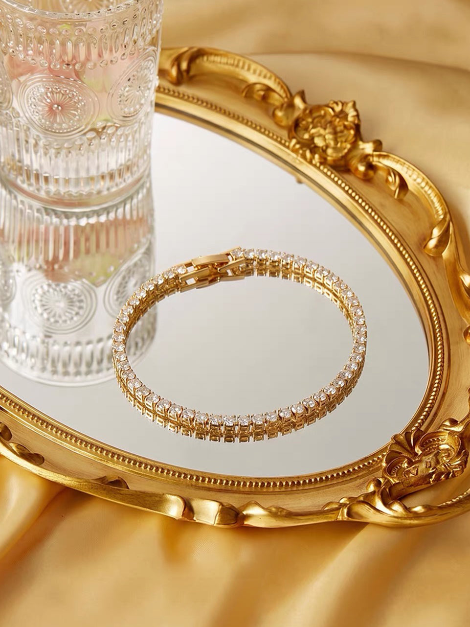 Timeless Diamond-Look Tennis Bracelet featuring a continuous row of premium-grade zirconia set in a classic gold-tone tennis bracelet design.