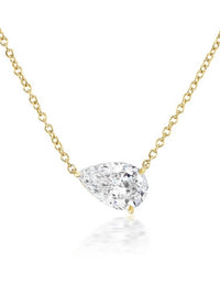 3CT pear cut moissanite solitaire necklace in 925 sterling silver with a delicate chain and minimalist setting.