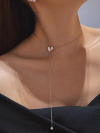 Poetic Three Petal Moissanite Flower Necklace with an asymmetric three-petal design and delicate cascading detail.