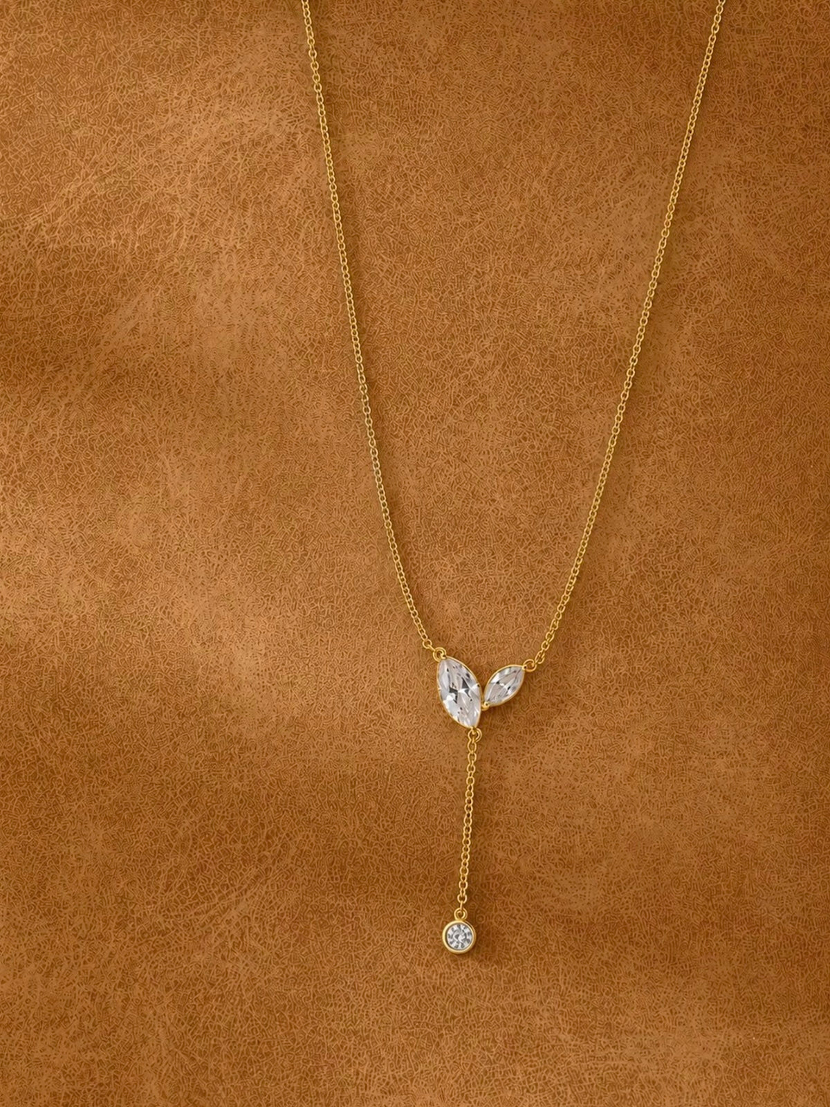 Poetic Three Petal Moissanite Flower Necklace with an asymmetric three-petal design and delicate cascading detail.
