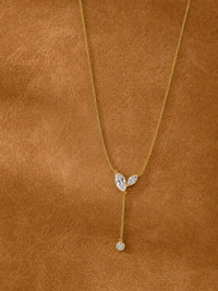 Poetic Three Petal Moissanite Flower Necklace with an asymmetric three-petal design and delicate cascading detail.