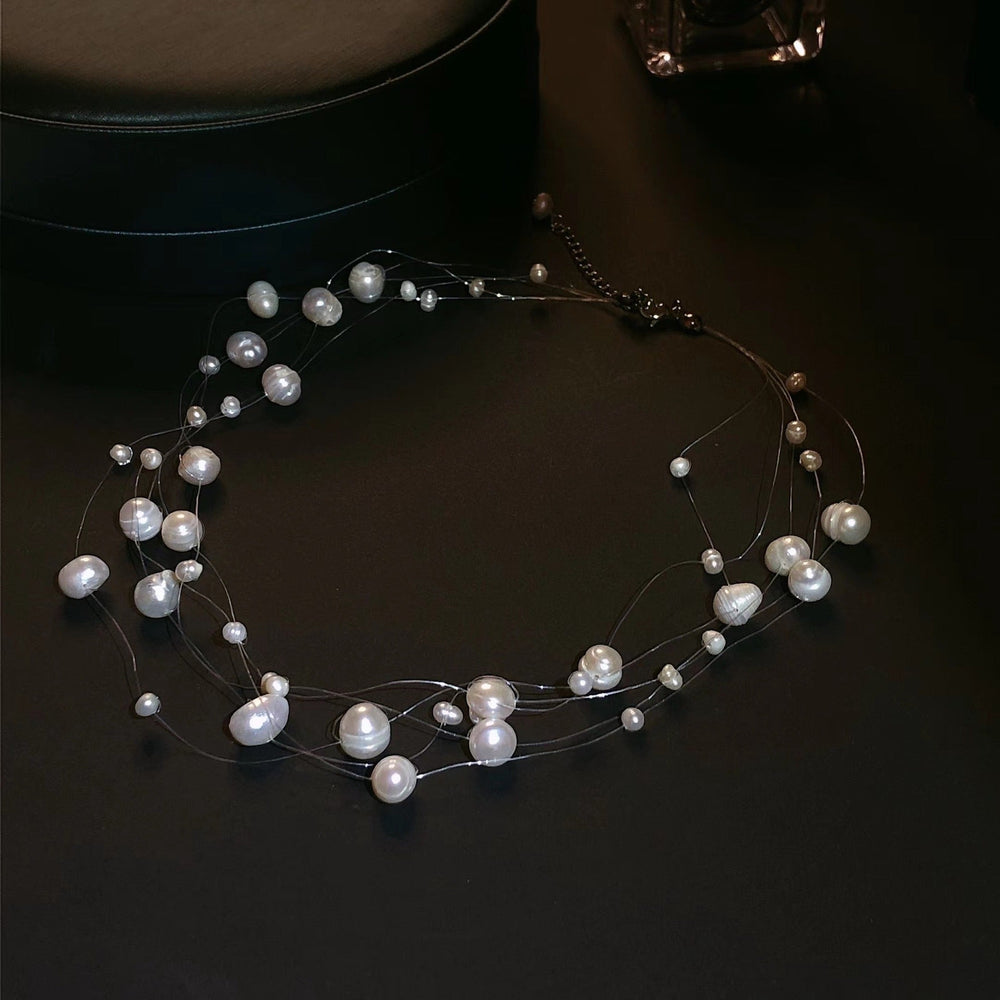 Floating Freshwater Pearl Bridal Choker with genuine freshwater pearls suspended on transparent strands, creating an elegant floating illusion around the neckline.