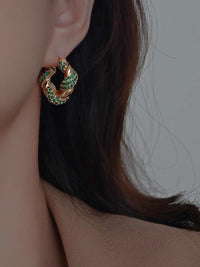 braided hoop earrings - green stones