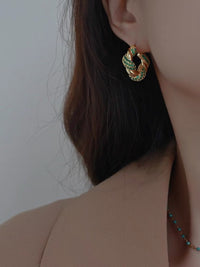 braided hoop earrings - green stones