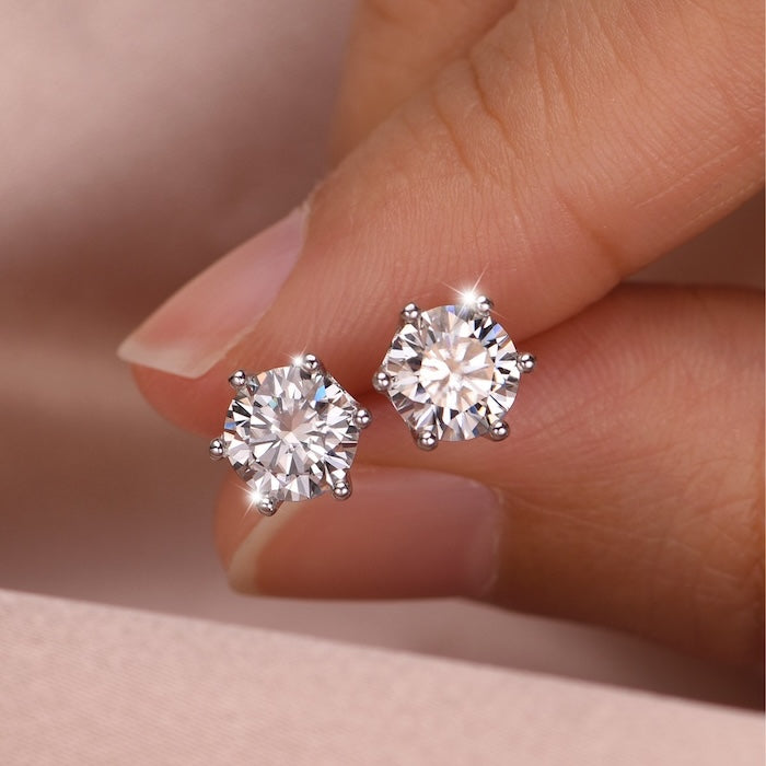 Classic 6 Claw Solitaire Moissanite Earrings featuring round brilliant moissanite stones secured in elegant six-claw stud settings.