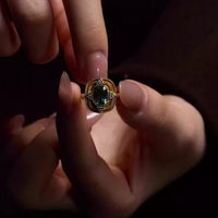 Royal Style Sky Blue Stone Ring featuring a sparkling sky-blue center stone surrounded by zirconia accents in a gold-plated vintage-inspired halo design.
