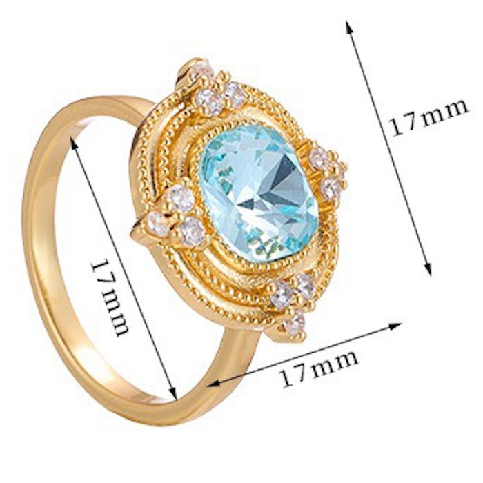 Royal Style Sky Blue Stone Ring featuring a sparkling sky-blue center stone surrounded by zirconia accents in a gold-plated vintage-inspired halo design.
