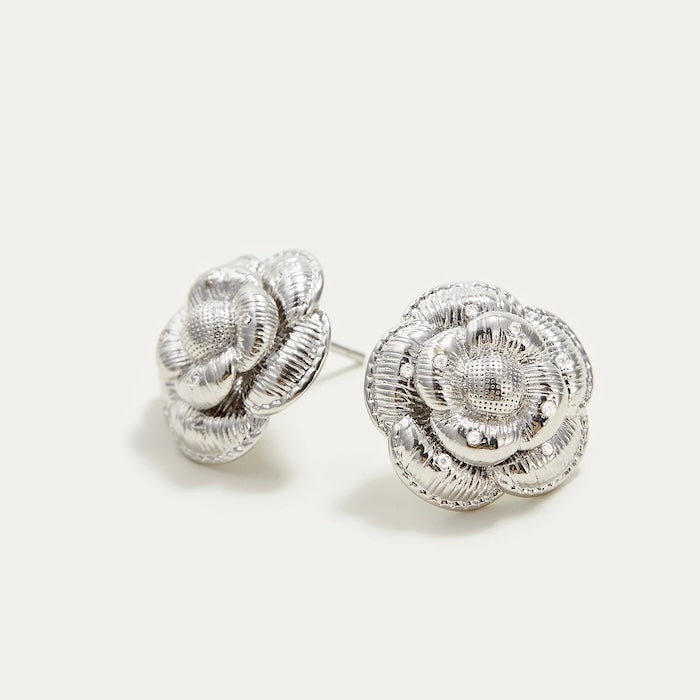 Sophisticated Silver Camellia Necklace and Earrings Set featuring delicate camellia-inspired floral details in a silver-plated finish with matching earrings.
