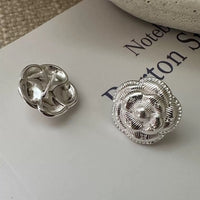 Sophisticated Silver Camellia Necklace and Earrings Set featuring delicate camellia-inspired floral details in a silver-plated finish with matching earrings.

