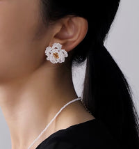Handmade Daisy Beaded Necklace and Earrings Set featuring handwoven white daisy flowers with gold-tone accents, a 76 cm beaded necklace, and matching floral earrings.
