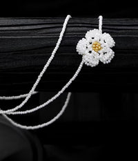 Handmade Daisy Beaded Necklace and Earrings Set featuring handwoven white daisy flowers with gold-tone accents, a 76 cm beaded necklace, and matching floral earrings.