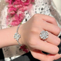 Dazzling Turning Four Leaf Clover Jewelry Set featuring rotating four-leaf clover earrings, pendant necklace, bracelet, and matching ring crafted in white gold plated brass with premium-grade zirconia.