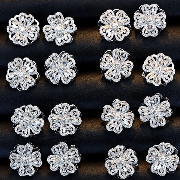 Dazzling Turning Four Leaf Clover Jewelry Set featuring rotating four-leaf clover earrings, pendant necklace, bracelet, and matching ring crafted in white gold plated brass with premium-grade zirconia.