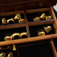 Vintage Colorful Flower Dome Ring featuring multicolor petal-shaped stones arranged in a floral pattern within a gold-tone dome setting.
