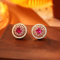 Vintage Style Halo Crystal Stud Earrings featuring a sparkling halo of zirconias surrounding a ruby red or sky blue center stone in a gold-tone vintage-inspired setting.
