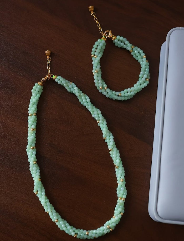 Lucky Jade Braided Necklace and Bracelet Set featuring genuine jade beads in an intricate braided design with gold-tone accents, convertible into a longer necklace.