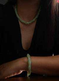 Lucky Jade Braided Necklace and Bracelet Set featuring genuine jade beads in an intricate braided design with gold-tone accents, convertible into a longer necklace.