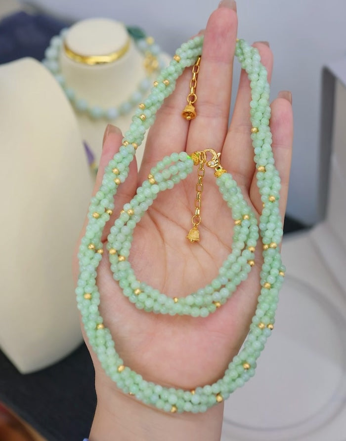 Lucky Jade Braided Necklace and Bracelet Set featuring genuine jade beads in an intricate braided design with gold-tone accents, convertible into a longer necklace.