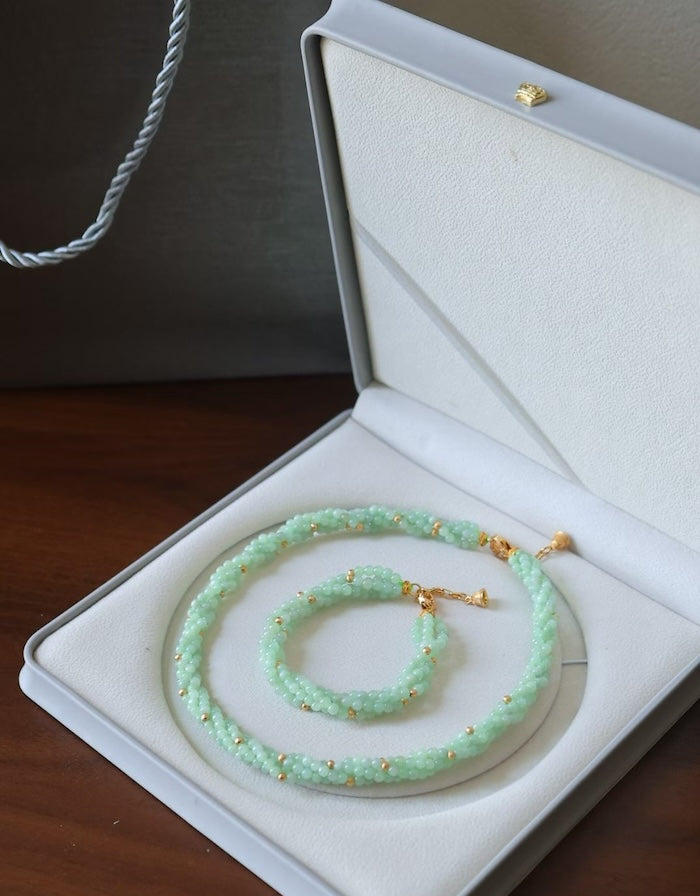 Lucky Jade Braided Necklace and Bracelet Set featuring genuine jade beads in an intricate braided design with gold-tone accents, convertible into a longer necklace.