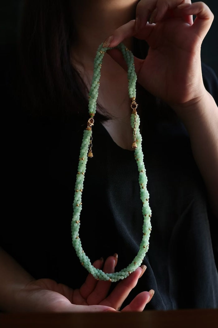 Lucky Jade Braided Necklace and Bracelet Set featuring genuine jade beads in an intricate braided design with gold-tone accents, convertible into a longer necklace.