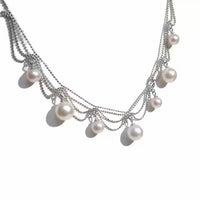 Lace Style Necklace with Genuine Freshwater Pearls featuring delicate layered chains and genuine baroque pearl drops in gold and silver-tone finishes, available in 3-pearl and 7-pearl designs.
