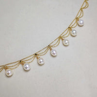 Lace Style Necklace with Genuine Freshwater Pearls featuring delicate layered chains and genuine baroque pearl drops in gold and silver-tone finishes, available in 3-pearl and 7-pearl designs.
