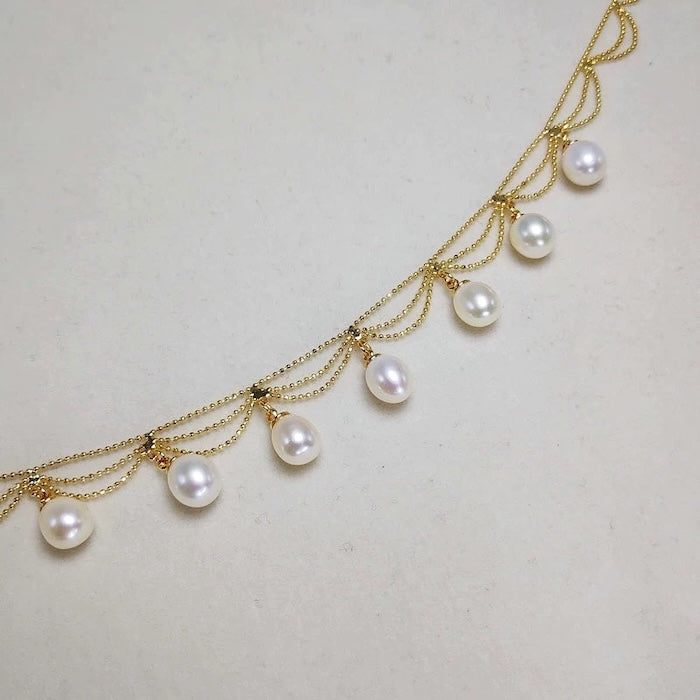 Lace Style Necklace with Genuine Freshwater Pearls featuring delicate layered chains and genuine baroque pearl drops in gold and silver-tone finishes, available in 3-pearl and 7-pearl designs.
