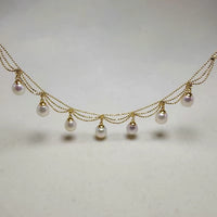 Lace Style Necklace with Genuine Freshwater Pearls featuring delicate layered chains and genuine baroque pearl drops in gold and silver-tone finishes, available in 3-pearl and 7-pearl designs.
