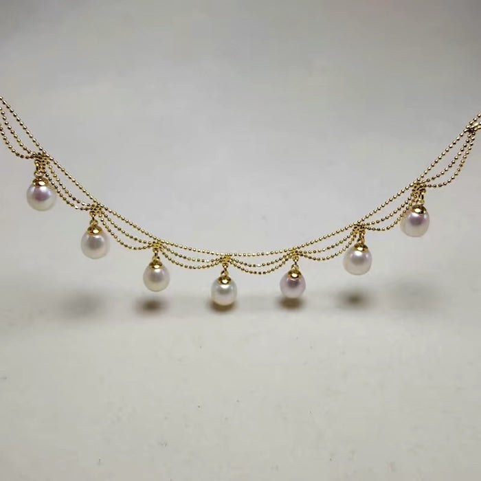 Lace Style Necklace with Genuine Freshwater Pearls featuring delicate layered chains and genuine baroque pearl drops in gold and silver-tone finishes, available in 3-pearl and 7-pearl designs.
