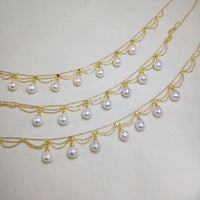 Lace Style Necklace with Genuine Freshwater Pearls featuring delicate layered chains and genuine baroque pearl drops in gold and silver-tone finishes, available in 3-pearl and 7-pearl designs.
