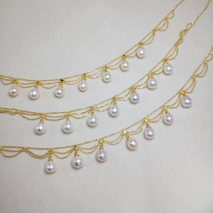 Lace Style Necklace with Genuine Freshwater Pearls featuring delicate layered chains and genuine baroque pearl drops in gold and silver-tone finishes, available in 3-pearl and 7-pearl designs.

