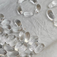Moonlit Clear Quartz Crystal Bracelet featuring genuine moon-shaped clear quartz crystals, polished round quartz beads, and gold vermeil separation beads in a handcrafted floral-inspired design.