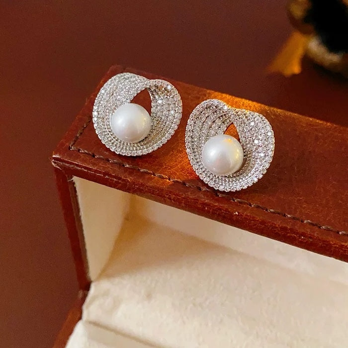 Luminous Pearl Embrace Stud Earrings
