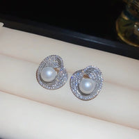 Luminous Pearl Embrace Stud Earrings

