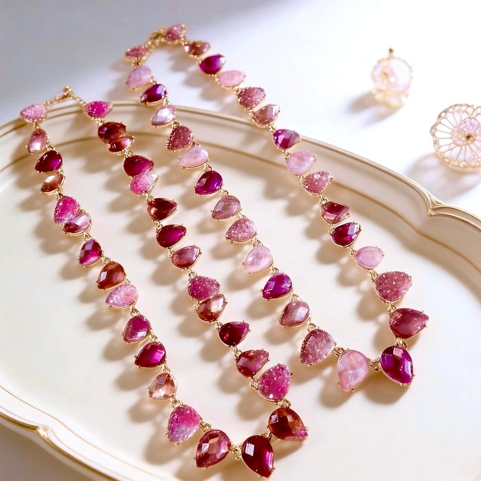 Chunky Vintage Pink Crystal Statement Necklace featuring sparkling pink crystal drop beads and matte gold plated details in a vintage-inspired statement design.
