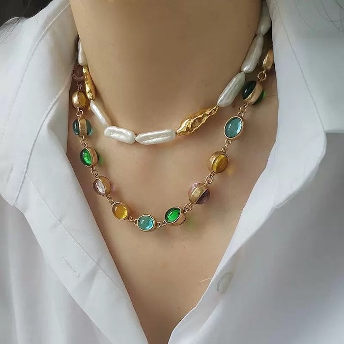 Vintage Rainbow Glass Stones Jewelry Set featuring multicolor glass stones in green, blue, pink, and amber tones linked in a gold-tone vintage-inspired necklace and bracelet design.
