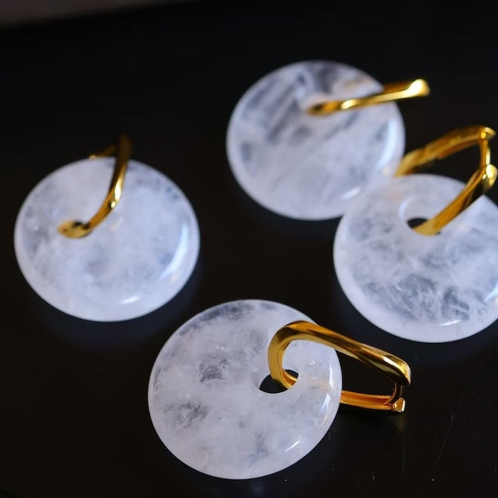 Minimalist Round Clear Quartz Earrings featuring genuine clear quartz crystal discs suspended from elegant gold vermeil findings.