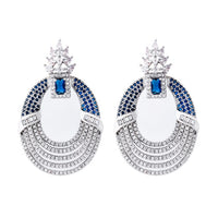 Royal Style Sapphire Look Oversized Earrings featuring sapphire-blue zirconias, sparkling pavé crystal details, and an elegant silver-tone statement design.

