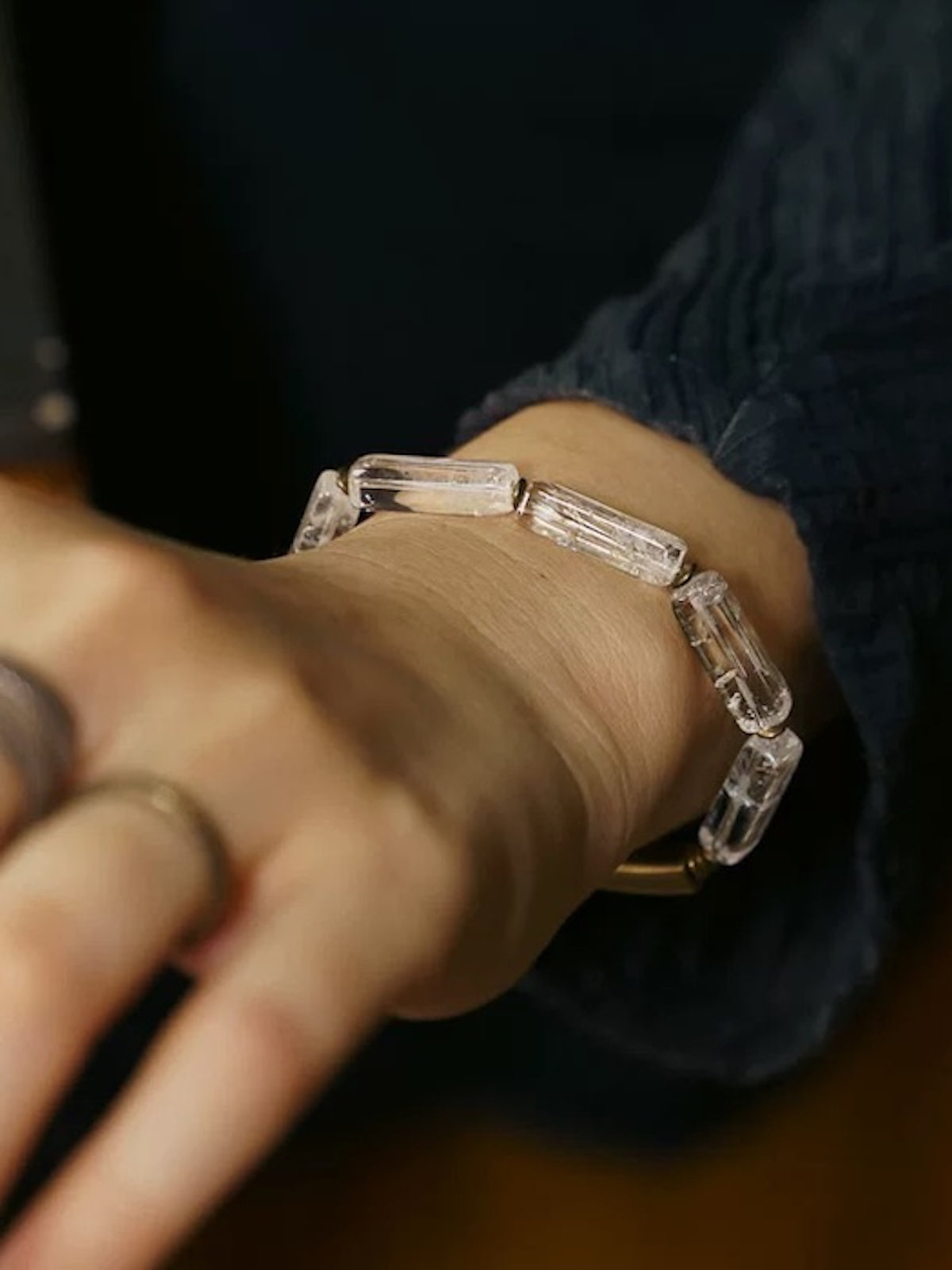 Clear Quartz Bar Bracelet featuring genuine clear quartz stone bars, bronze-toned findings, and a vintage-inspired charm.