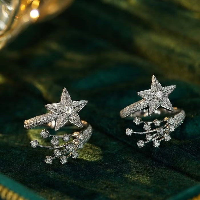 Radiant Starfall jewelry set featuring sparkling celestial star stud earrings and a matching adjustable ring crafted in white gold plated brass with premium grade zirconia.
